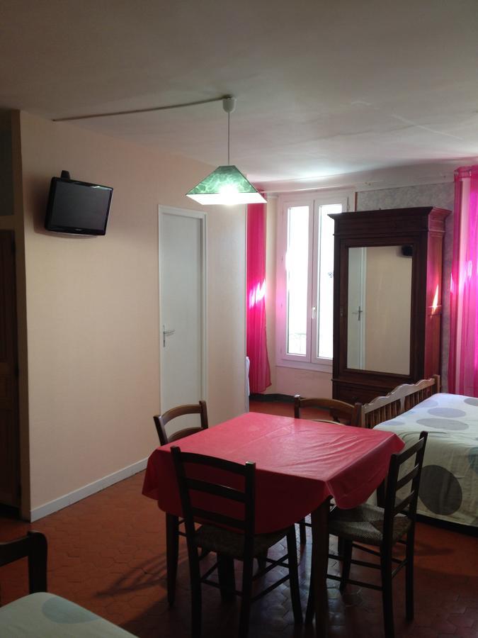 Bar Hotel De La Place Mezel ภายนอก รูปภาพ